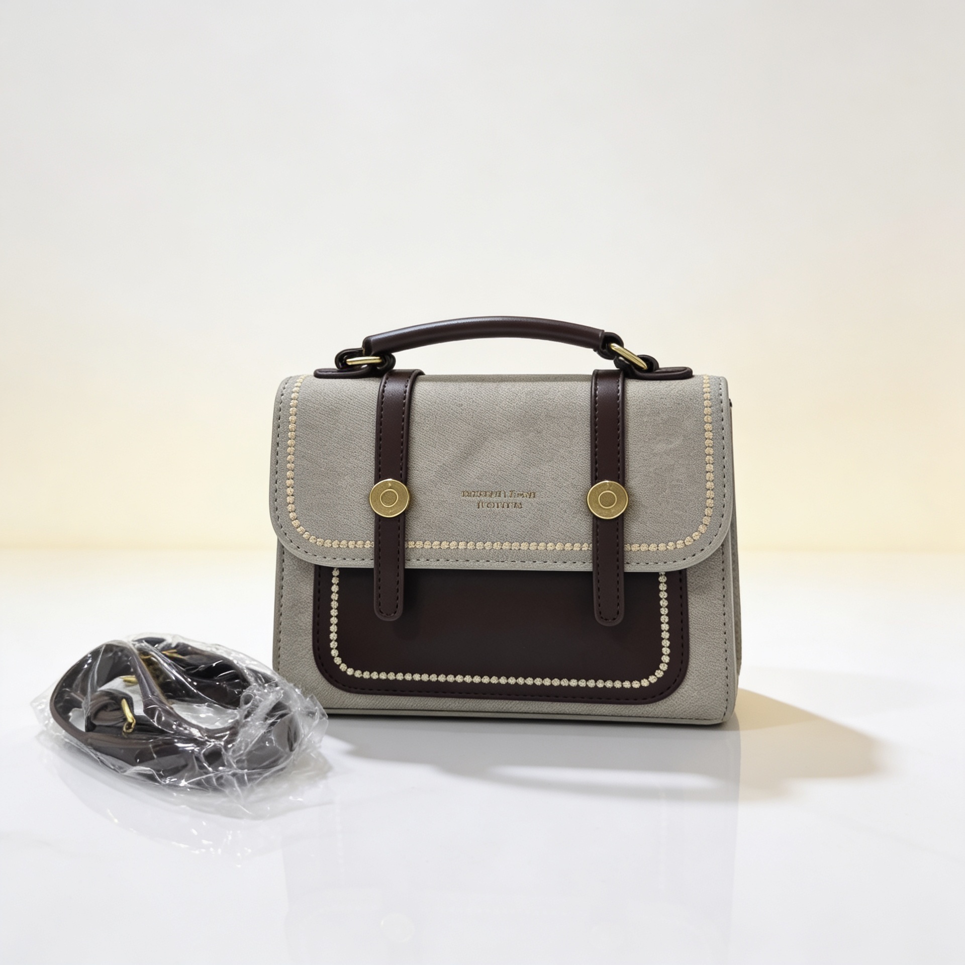 Luxury sage green canvas and brown leather satchel handbag with gold chain strap for women